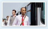 Man in tie boarding bus